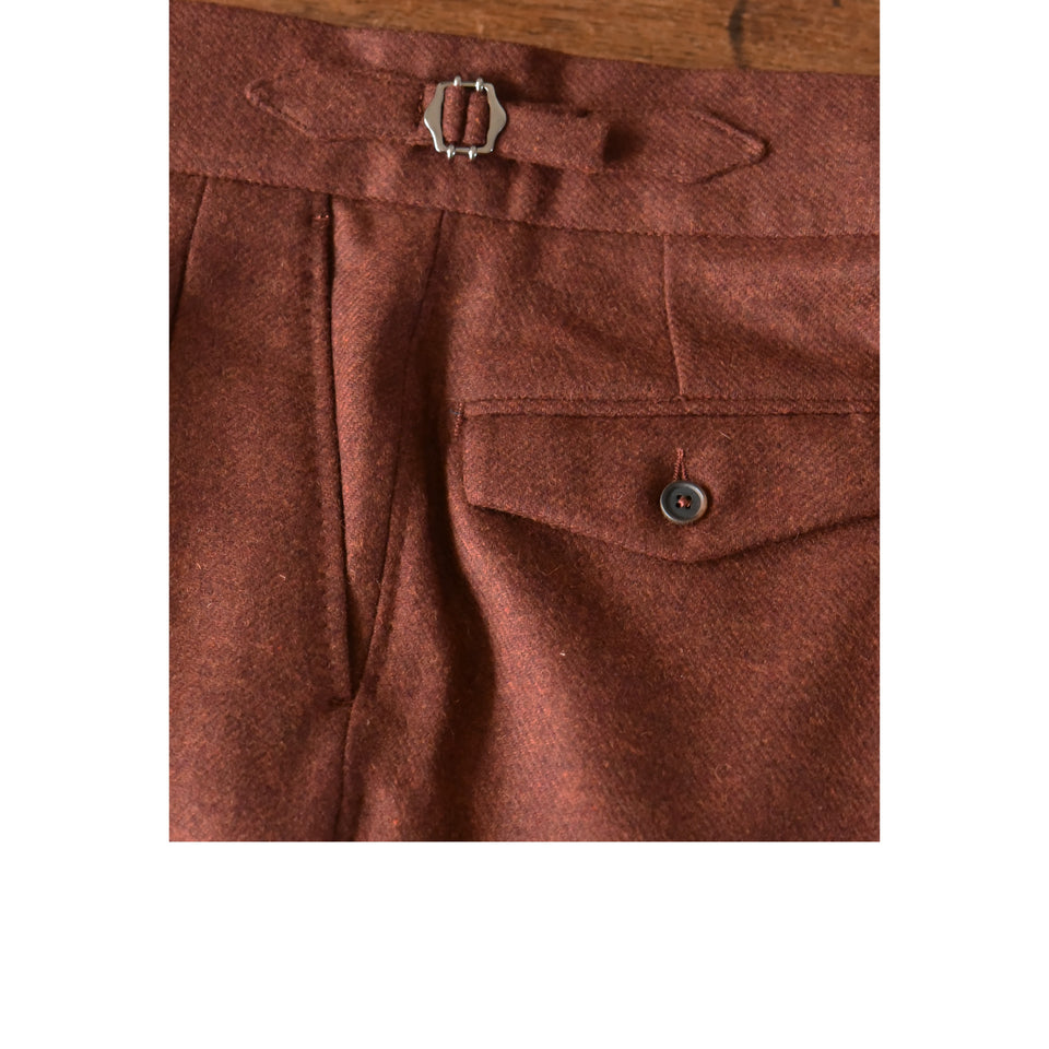 Amidé Hadelin | MTO | Merino tweed trousers - dark rust_side tab