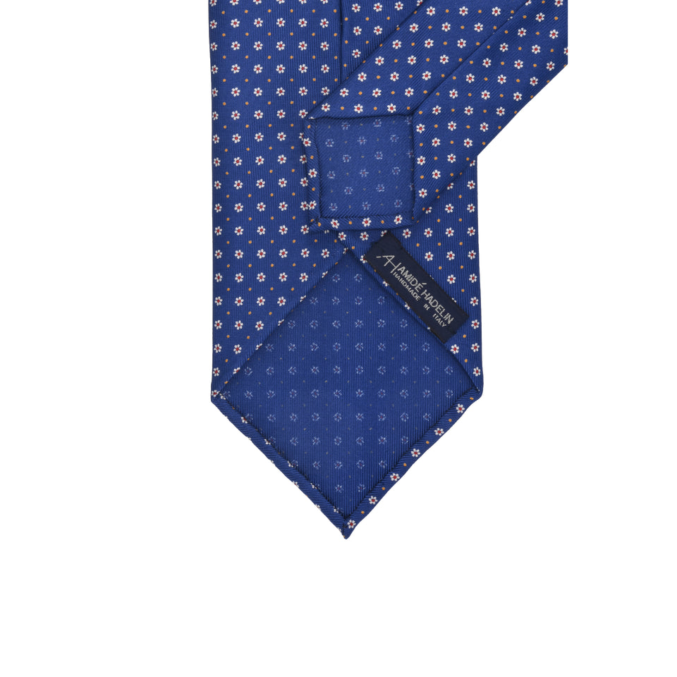 Amidé Hadelin | 9-fold handprinted silk floral tie untipped, blue_back